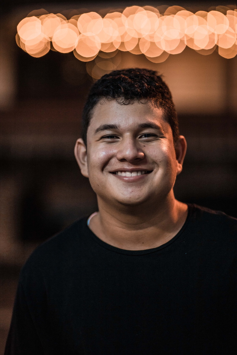 real people, toothy smile, portrait, happiness, 5K, front view, purple, focus on foreground, party, headshot, leisure activity, photo, focus, looking at camera