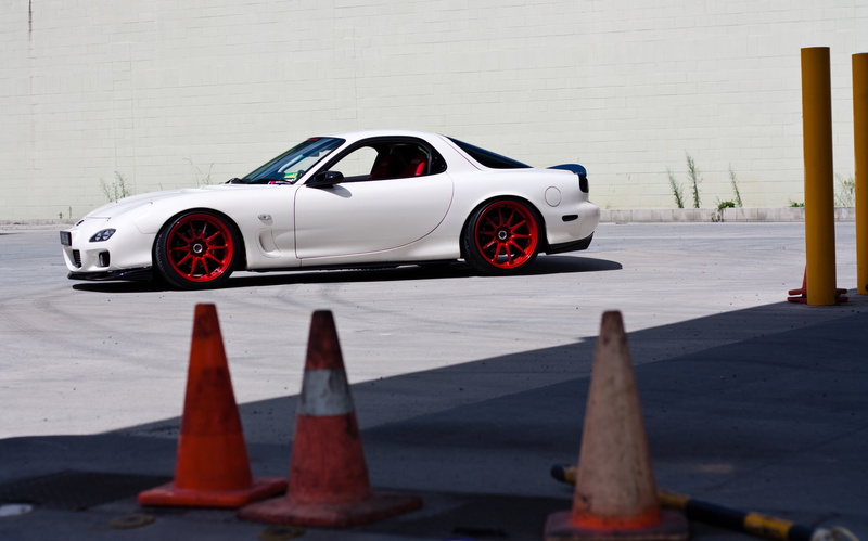 alloy Wheel, road, outdoors, Mazda rx7, cars, supercar, fuel and Power Generation, nature, mode of Transport, racecar, status Car, engine, asphalt, protection