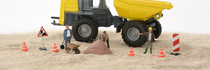 yellow, person, road, under construction, land, wheelbarrow, figure, motor vehicle, no people, white, mode of transportation, craftsmen, head image, construction site