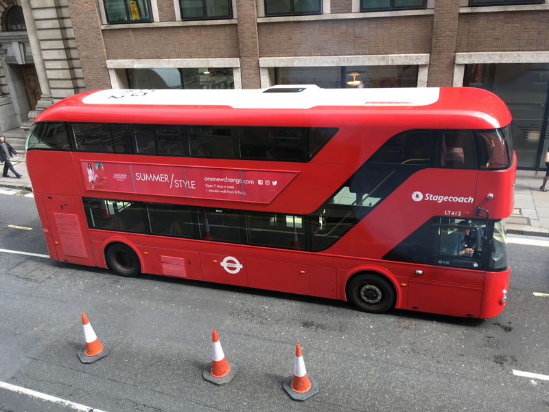 day, traffic cone, newgate street, building exterior, western script, communication, city, stationary, mode of transportation, wheel, outdoors, built structure