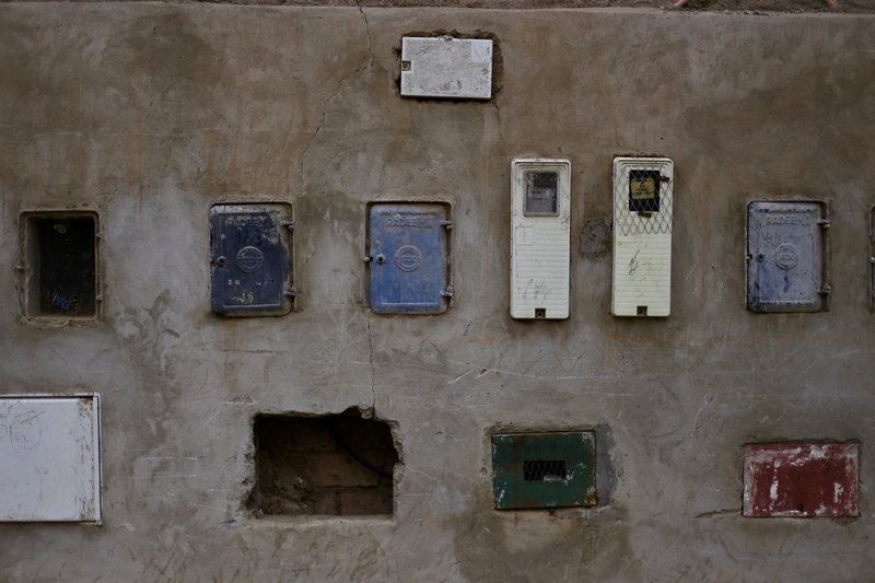 no people, building exterior, fuse box, window, marrakech, building, morocco, in a row, medina, structure, wall - building feature, fuel and power generation