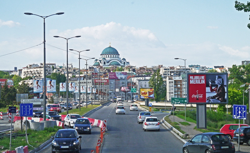 mode of transportation, hill, cityscape, serbian orthodox, day, incident road, city street, serbia, land vehicle, house of worship, church, Dom, sky, shuttle