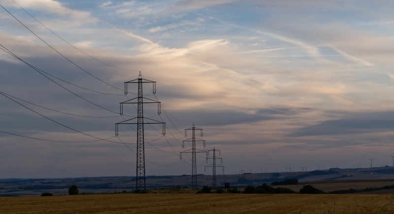 beauty in nature, field, outdoors, industry, environment, electricity, water, structure, insulator, sunset, 5K, power line, landscape, clouds, scenics - nature