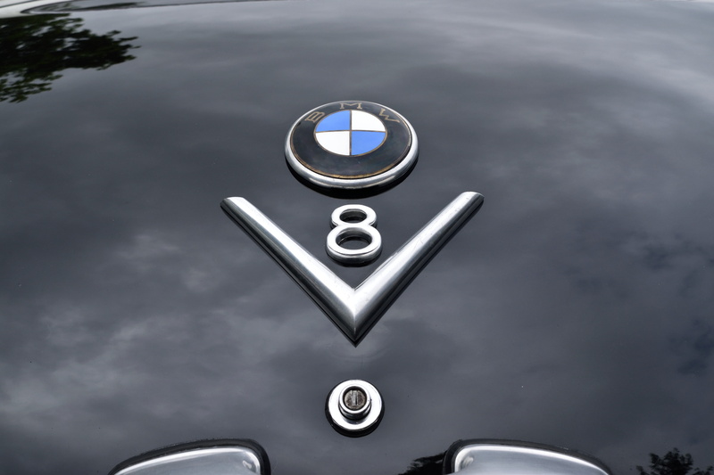 design, motor vehicle, geometric shape, shape, outdoors, car, communication, vehicle, 5K, veteran, circle, black, chrome, silver colored, mode of transportation