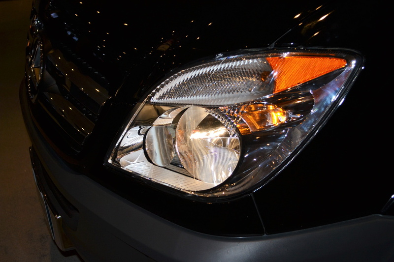 orange color, parts, no people, land vehicle, shiny, reflectors, close-up, front, headlight, car, black, halogen lamp, automotive, electric lamp, illuminated
