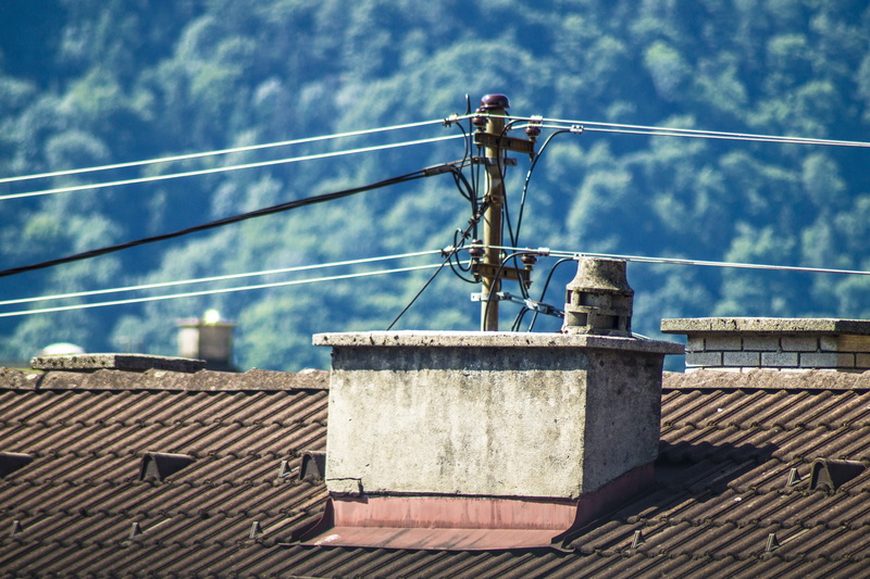 built structure, fireplace, building exterior, no people, day, power lines, power supply, sky, fuel and power generation, cloud - sky, outdoors, connection