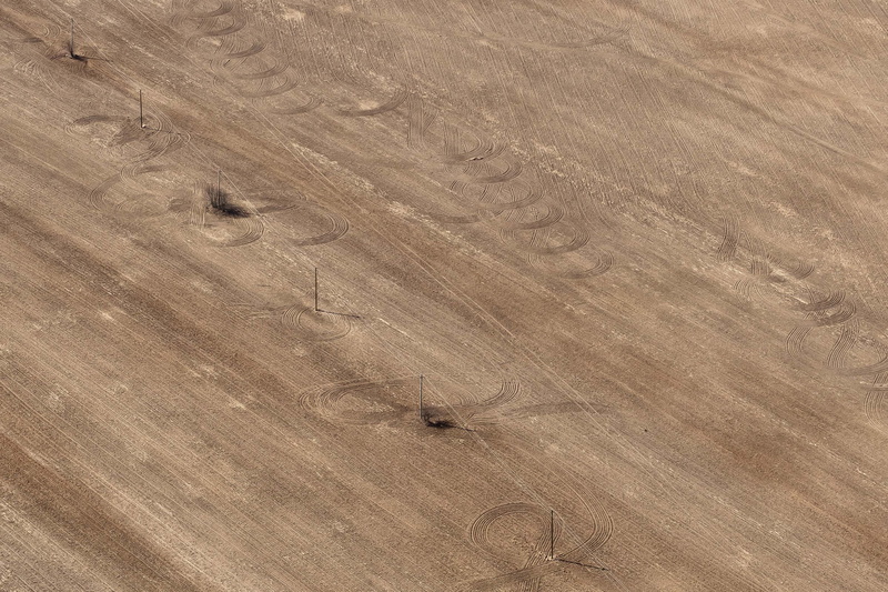 power line, textured, vehicle track, photo, high angle view, no people, 2K, farm, line, wooden, dirt, field, electric, texture, tire track, close-up, track