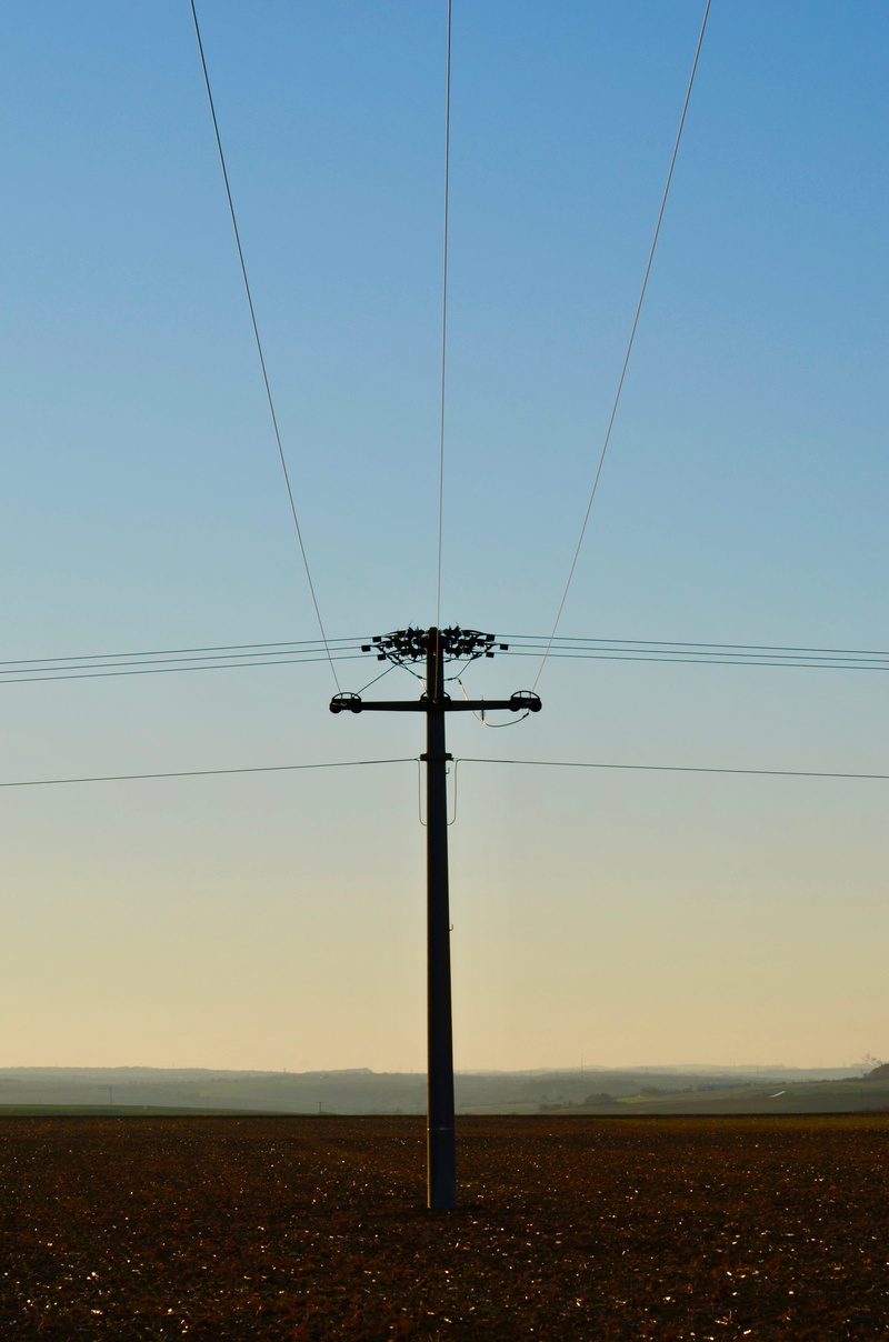 clear sky, no people, electricity pylon, sky, landscape, tranquil scene, telephone line, electrical equipment, pylon, reinforce, 4K, low angle view, field