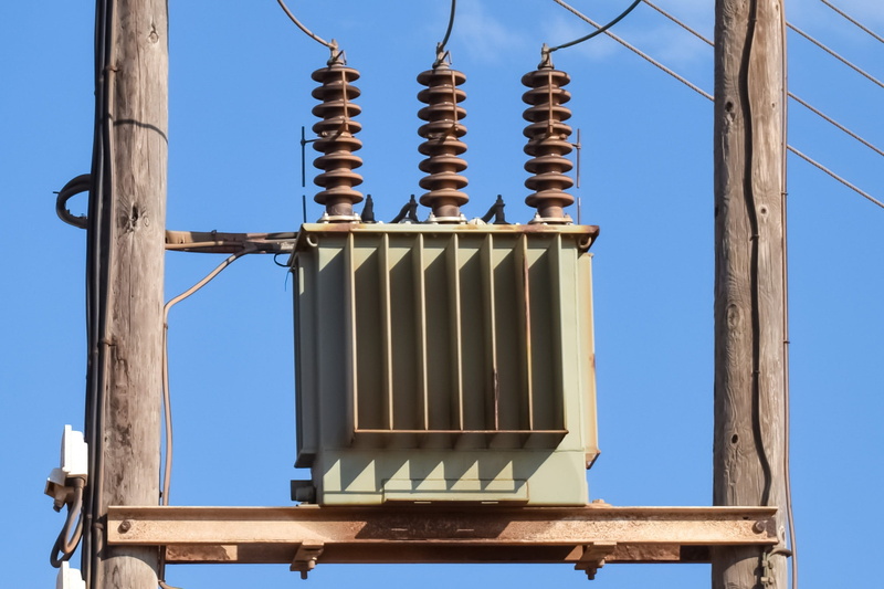 clear sky, architecture, wire, power supply, electric, outdoors, fuel and power generation, close-up, power, connection, low angle view, voltage, pole