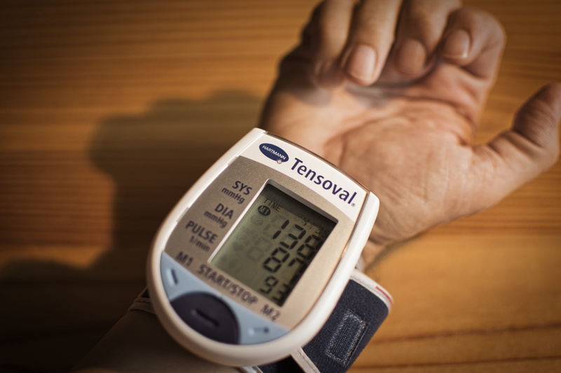 disease, one person, hypertension, communication, indoors, hand, healthcare and medicine, instrument of measurement, finger, medical, body part, focus on foreground