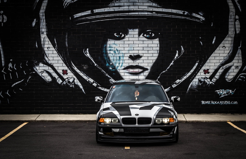 city, no people, vehicle, art and craft, mode of transportation, building exterior, human representation, land vehicle, E38, text, white, creativity, 4K