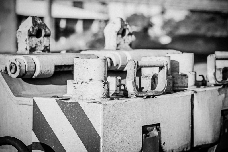 selective focus, metal, close-up, no people, 5K, equipment, obsolete, seemed, traffic, track, outdoors, industrial equipment, water, day, railroad tracks