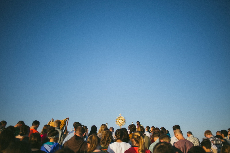 watching, women, copy space, blue, festival goer, large group of people, standing, crowd, adoration, real people, group, monstrance, group of people, near