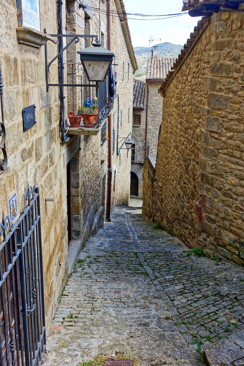 wall - building feature, footpath, no people, 5K, day, direction, the way forward, architecture, city, built structure, stone wall, landscape, building exterior