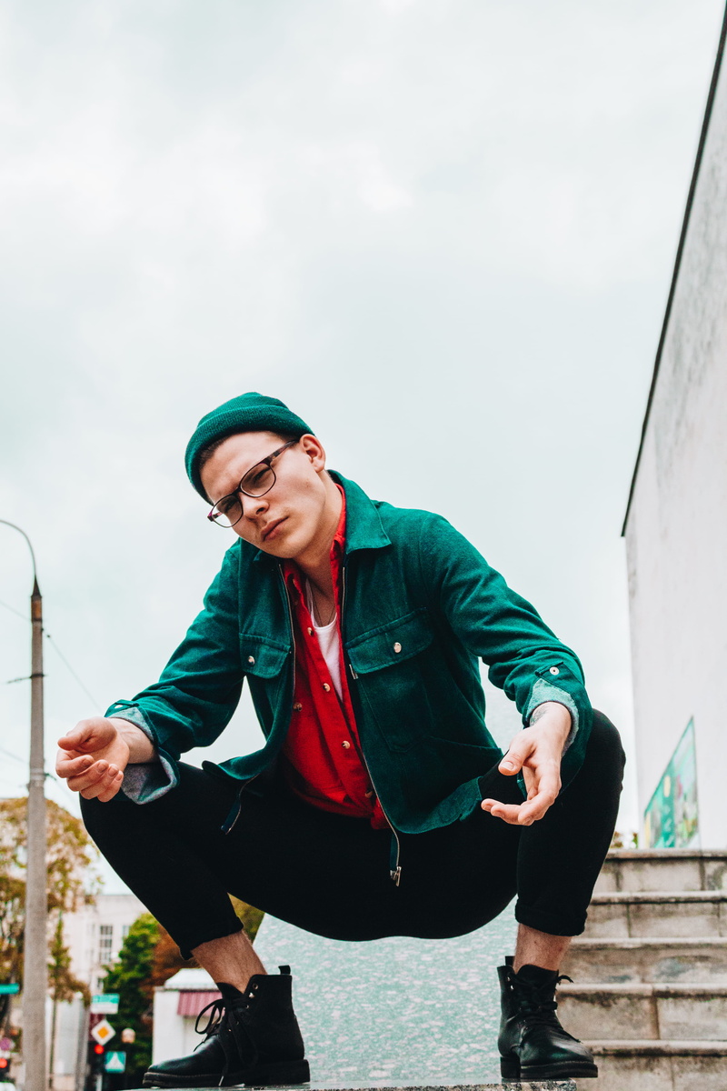 three quarter length, wearing, standing, wedge, green, apparel, architecture, leisure activity, brown, stair, leisure activities, person, casual clothing
