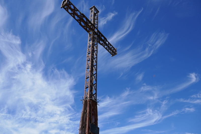 low angle view, wire, construction industry, cloud - sky, cross, built structure, tall - high, machinery, outdoors, architecture, iron, wood - material