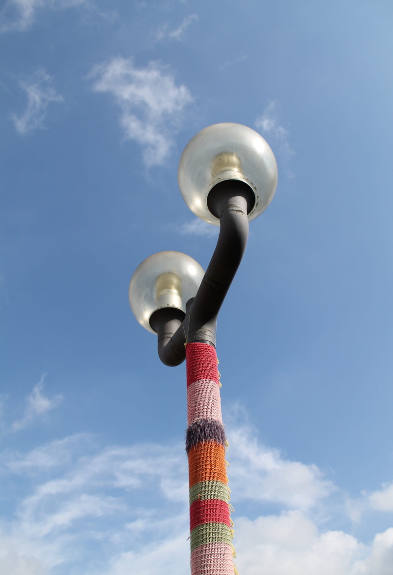 hand labor, building exterior, lighting equipment, trend, lamp, sphere, colorful, outdoors, urban knitting, red, street, guerilla knitting, 4K, day, tall - high