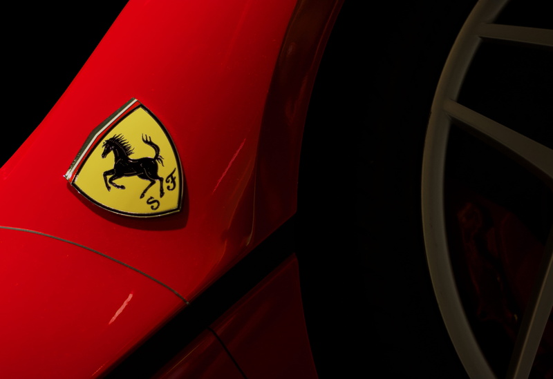 design museum, close-up, forza, information, close, motor vehicle, 5K, auto, logo, red, text, illuminated, no people, sign, close up, ferrari