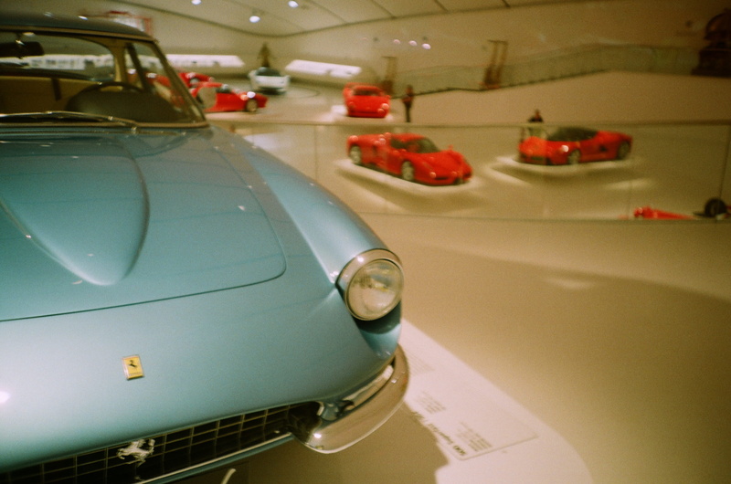 retro, red, indoors, lomo, motion, land vehicle, time, vehicle hood, modena, side view, no people, luxury, motor vehicle, enzo ferrari museum, speed, accuracy