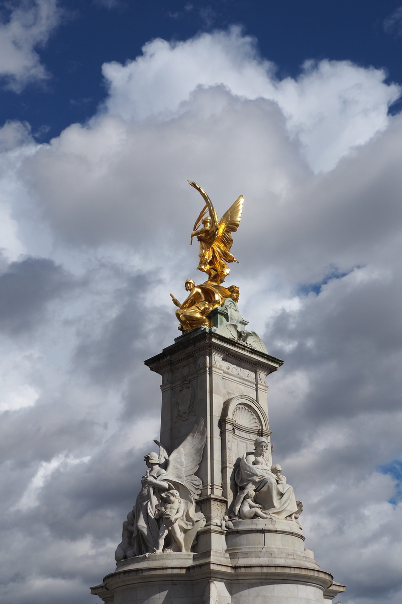 no people, human representation, landmark, creativity, united kingdom, female likeness, golden, sky, cloud - sky, queen victoria, architectural column