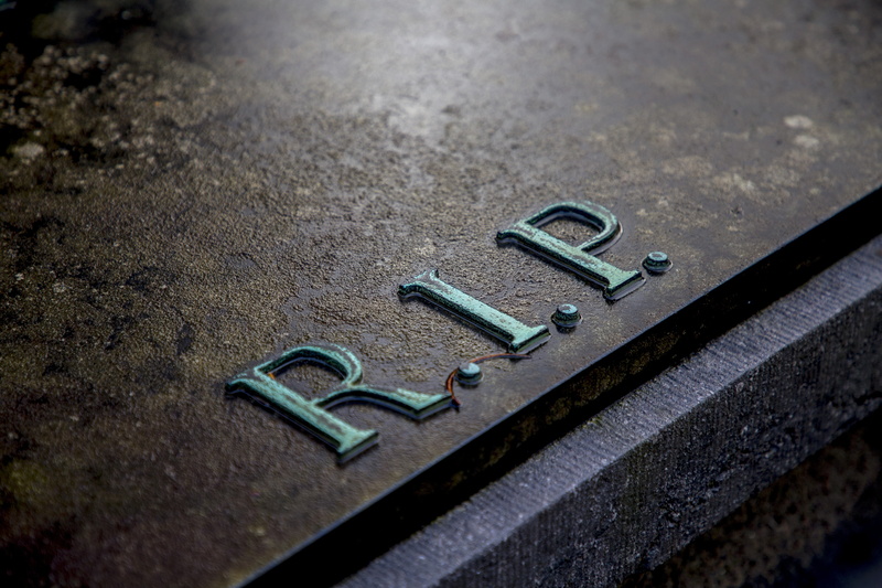 selective focus, work tool, rip, outdoors, key, city, grave, rest in peace, close-up, indoors, land vehicle, death, text, high angle view, still life, number