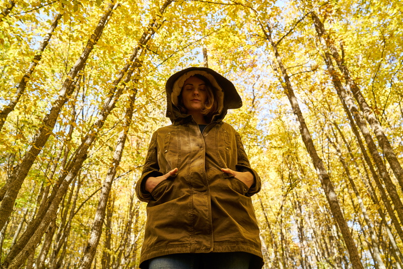 one person, clothing, dramatic, day, yellow, only, change, low angle view, sad, real people, exposure, depression, outdoors, emotional, standing, nature