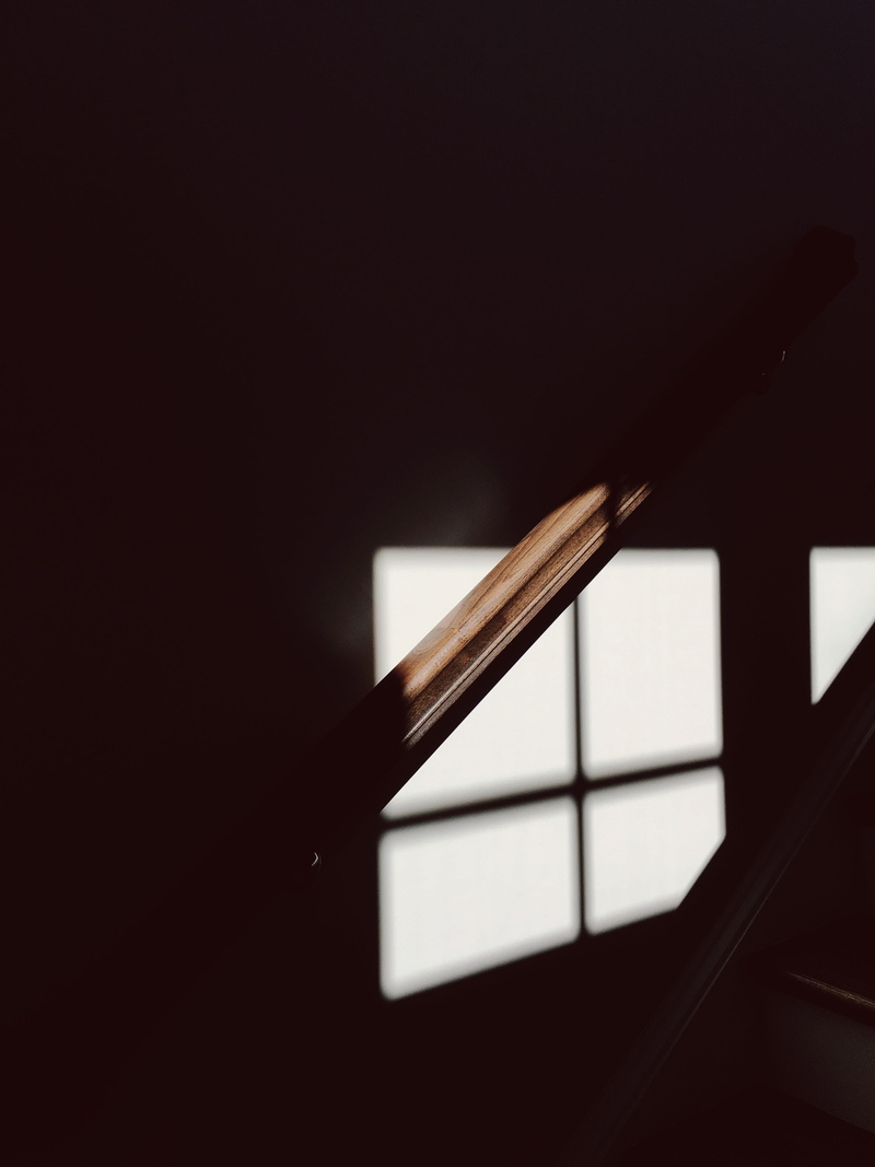 light, focus on foreground, dark, time, photo, 4K, shot, selective focus, close up, copy space, writing instrument, studio shot, single object, wooden