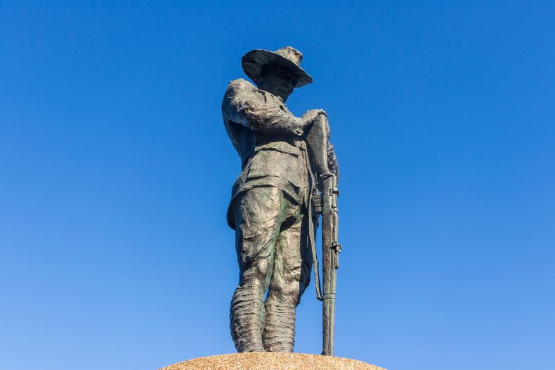 tribute, sky, history, day, clear sky, male likeness, symbol, sculpture, representation, copy space, craft, remembrance, army, memorial, low angle view