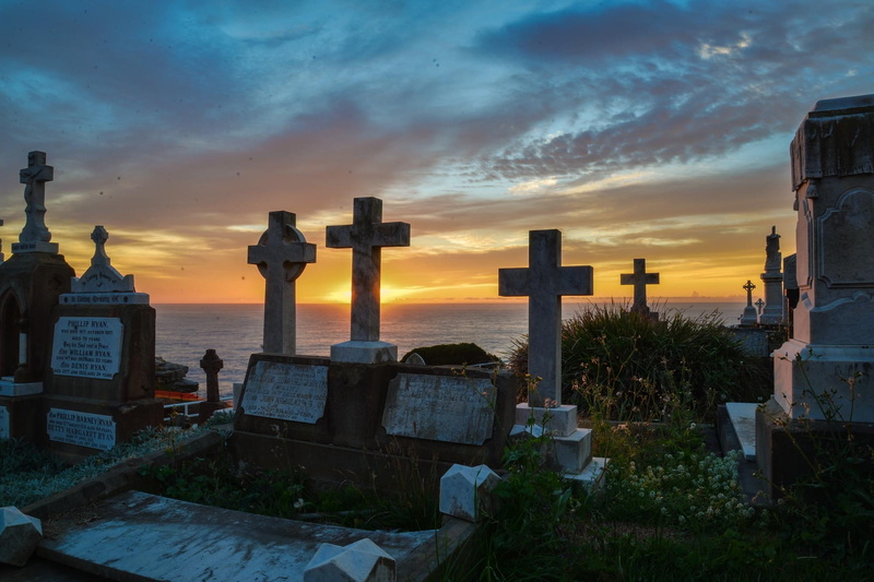 religion, water, belief, cross, architecture, headstones, outdoors, sunrise, cloud - sky, graves, grave, graveyard, orange, cemetery, tombstone, nature