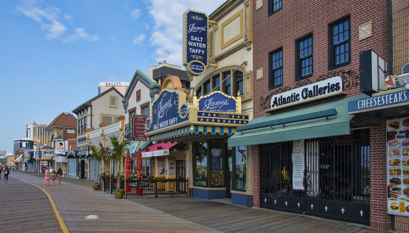 architecture, residential district, 5K, resort, casino, travel, outdoors, built structure, footpath, street, vacation, city, city life, ocean, shop, text