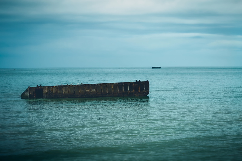 historic, no people, overlord, water, coastline, horizon, day, arromanches, abandoned, horizon over water, tranquility, d-day, mode of transportation, sky