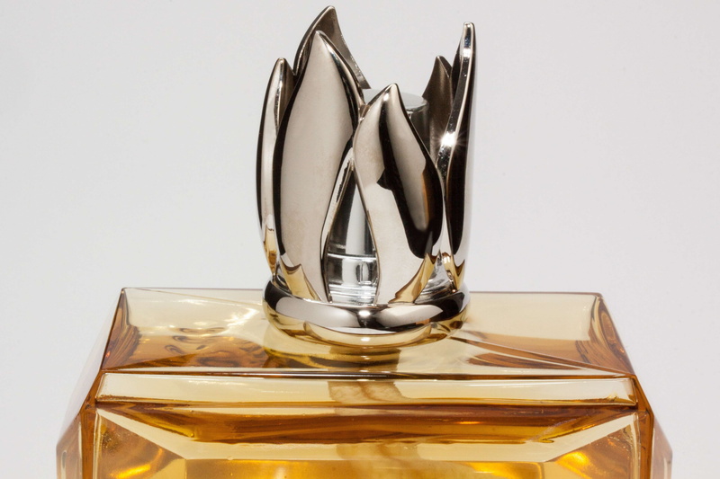 still life, luxury, bottle closure, metal, no people, white background, indoors, stylized, noble, glass - material, close-up, air improvement, lamp, closure