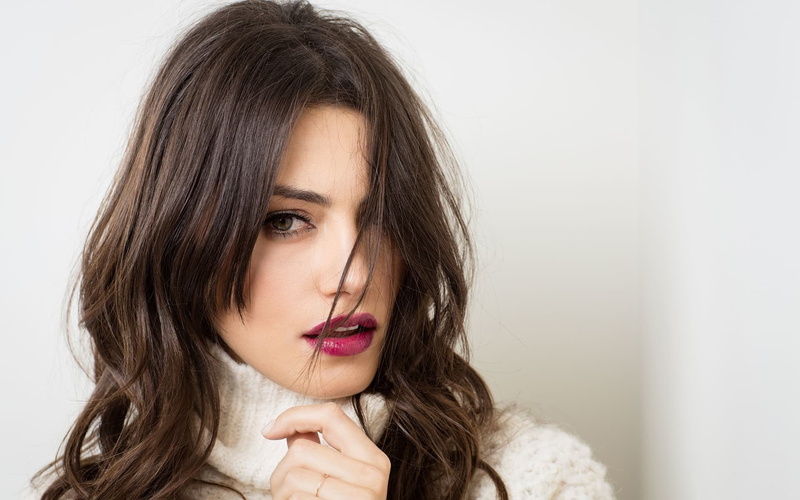 white background, portrait, one person, beautiful woman, body part, human face, hand, hair, women, Phoebe Tonkin, white  background, white sweater, headshot