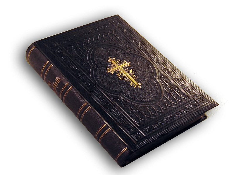 black color, leather, indoors, publication, no people, hardbound, religion, holy, black, Bible, white background, god, cut out, close up photography, book
