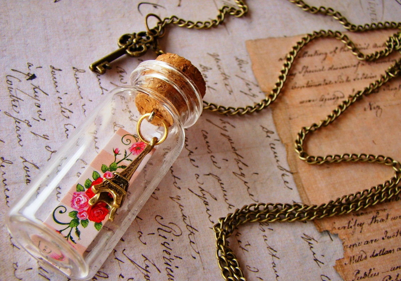 book, indoors, antique, still life, La tour Eiffel, old, cultures, close-up, figurine, backgrounds, France, jewelry, letter, floral pattern, key, praying
