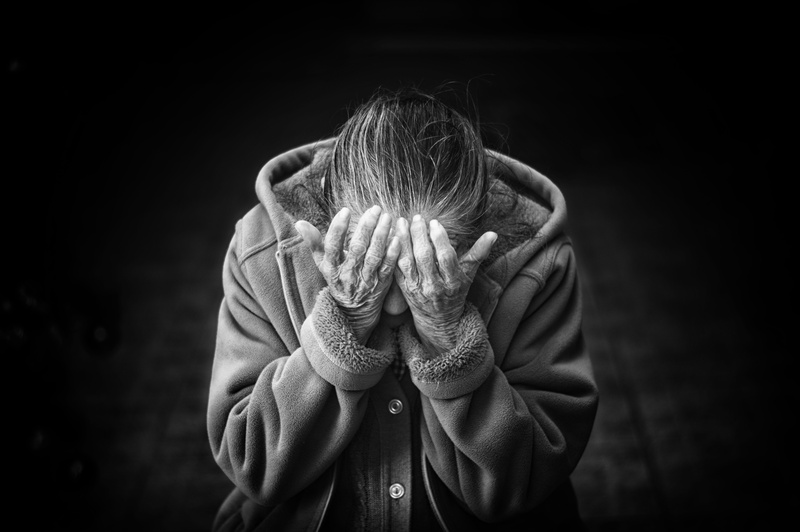 emotional stress, head in hands, obscured face, human body part, indoors, confused, depression - sadness, unrecognizable person, dark, human hand, hoodie