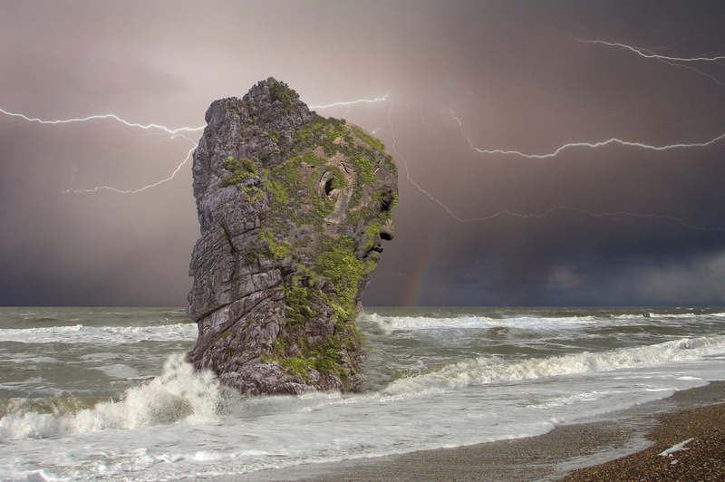 fantasy, landscape, power, outdoors, rock head, no people, power in nature, mystical, digital composite, ominous, sea, statue, sky, background, storm, clouds
