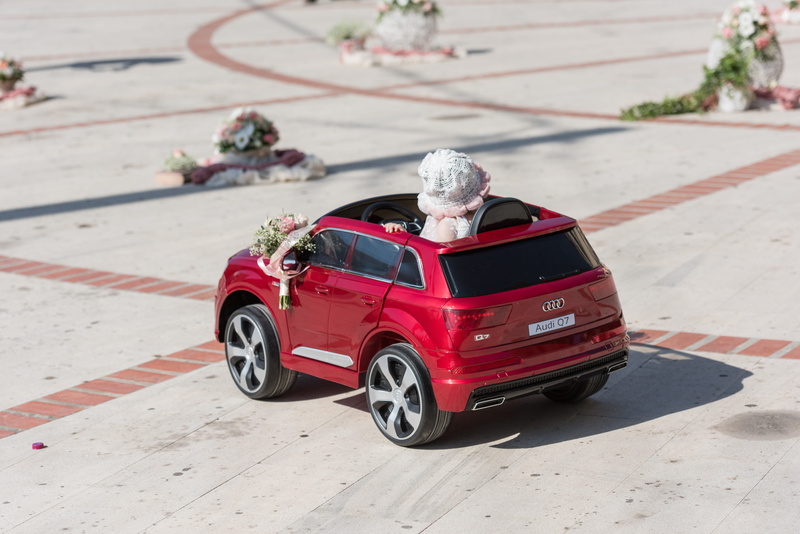 car, red, high angle view, focus on foreground, toy, motor vehicle, sunlight, outdoors, greece, children car, 5K, flooring, transportation, greek orthodox baptism