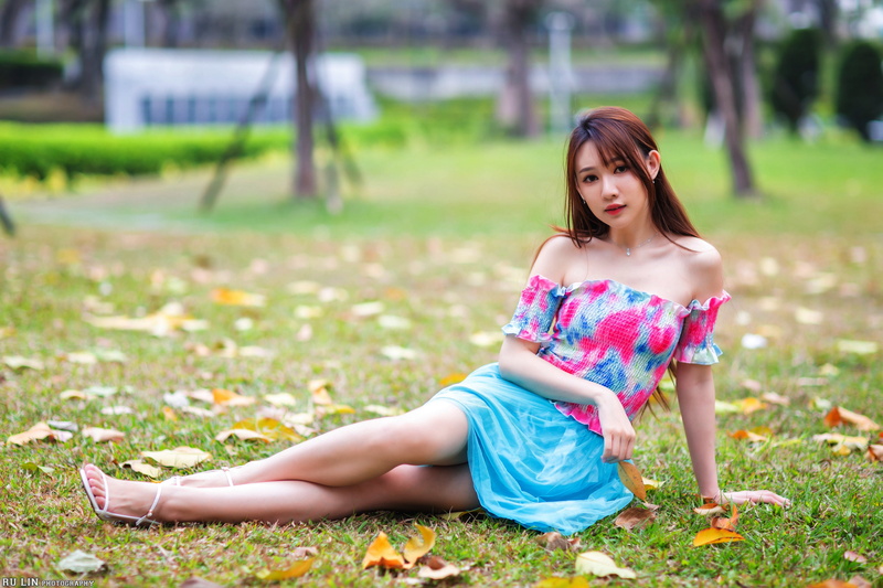 shirt, depth of field, blue skirt, trees, brunette, necklace, leaves, barefoot, model, white high heels, looking at viewer, 4K, Asian, earring, long hair