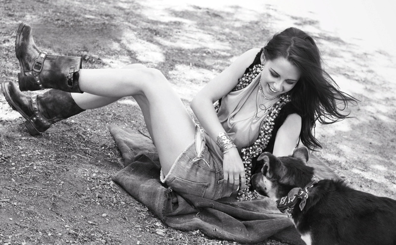 pet, domestic, smiling, celebrity, one animal, real people, young adult, domestic animals, dog, sitting, hairstyle, actress, legs, long hair, leisure activity