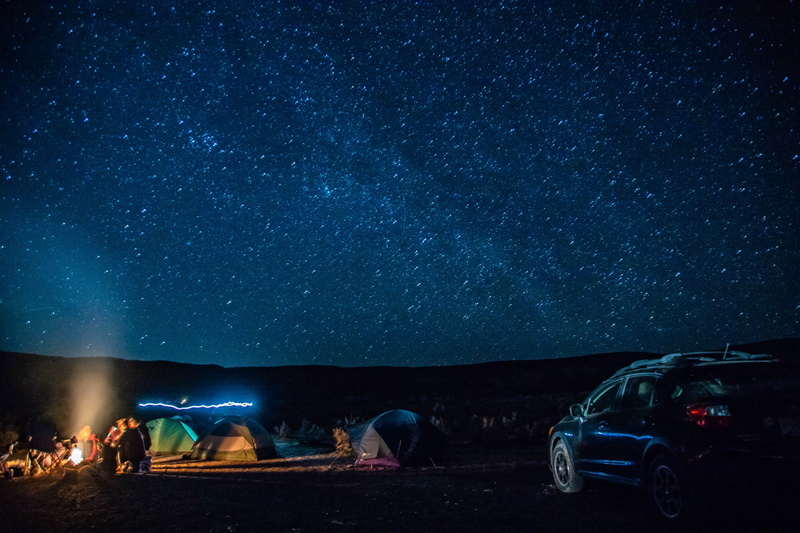 night, human, sky, space, star - space, land, tent, campfire, real people, camping, land vehicle, nature, milky way, car, mountain tent, outdoors, wheel