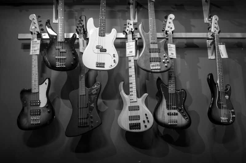 indoors, musical equipment, black and white, choice, strings, shopping, retail display, design, monochrome, 4K, music, string instrument, arts culture and entertainment