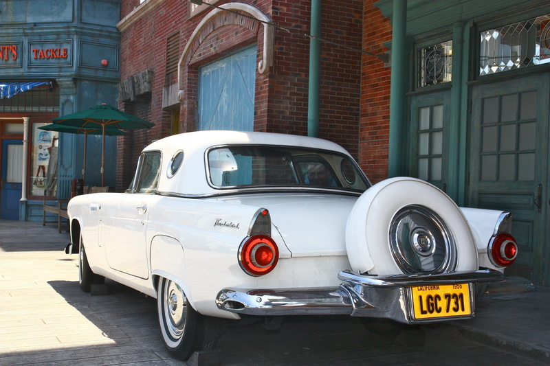 no people, building, motor vehicle, garage, entertainment, attraction, mode of transportation, classic car, hollywood, park, architecture, studios, text