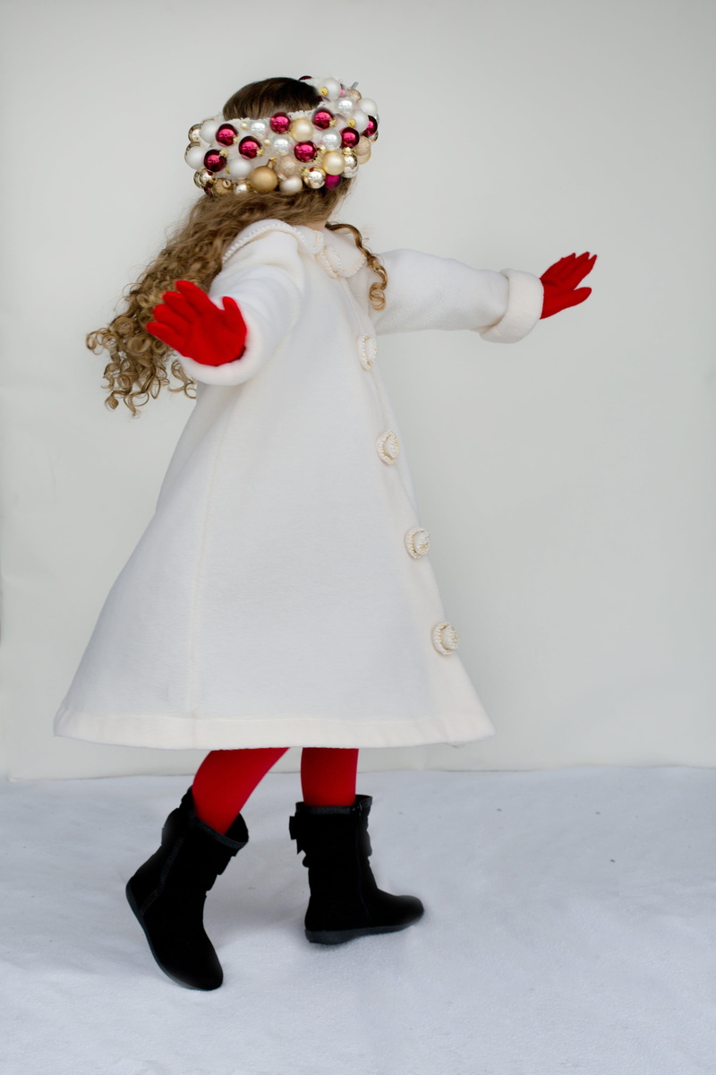 costume, coat, hairstyle, one person, indoors, females, arms raised, dancing, girl, white, obscured face, limb, women, human limb, leisure activity, little girl