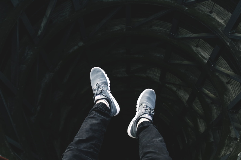 human Foot, walking, leisure activity, human Leg, low section, feet, body part, jeans, standing, outdoors, day, leather, nike, shoes, one person, men, high angle view