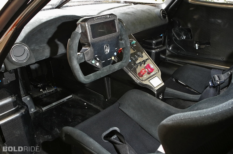 car interior, supercar, day, abandoned, vehicle part, car, interior, vehicle interior, steering wheel, mc12, supercars, travel, land vehicle, corsa, metal