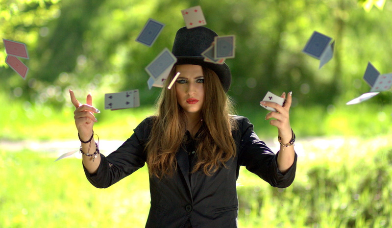 one Person, hat, graduation, magic, playing, beauty, hairstyle, females, holding, looking at camera, beautiful woman, portrait, shirt, university, front view