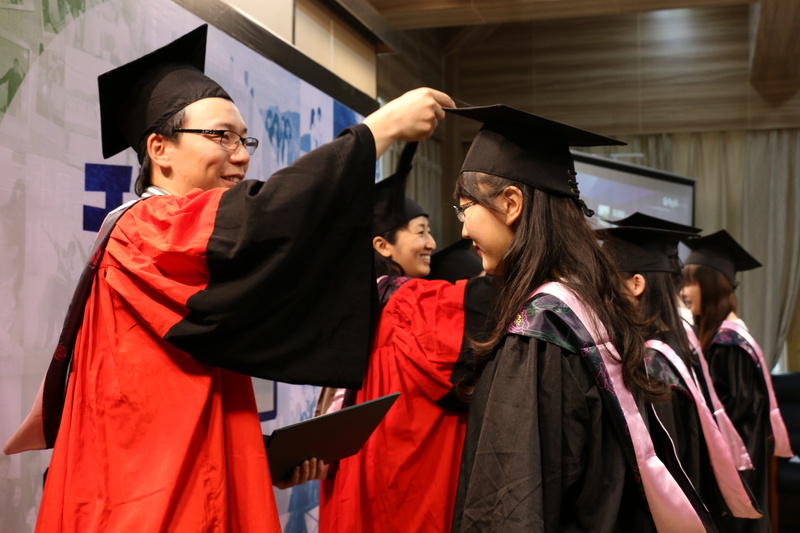 standing, university, man, adults only, square hat, young women, gown, giving, child, University Student, graduation, girl, outdoors, graduation gown, real people