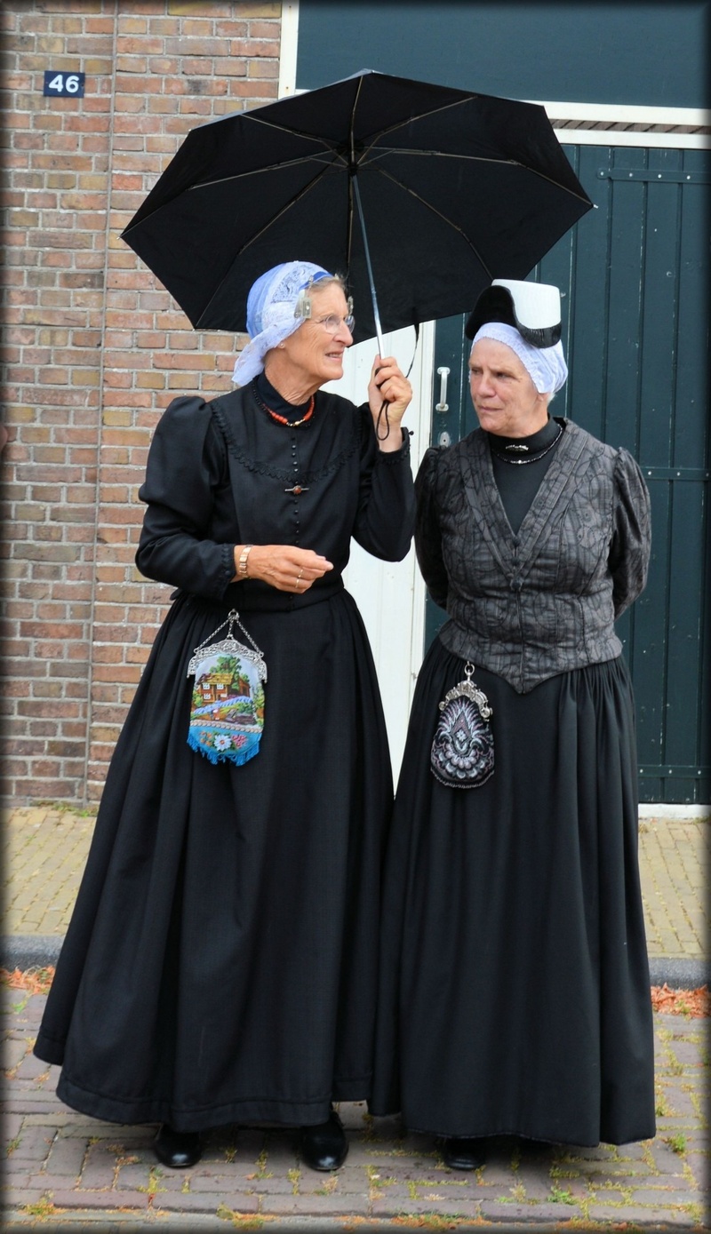 young adult, umbrella, costumes, males, standing, groups, men, adult, achievement, full length, tourist, folklore, holland, mortarboard, front view, mature adult