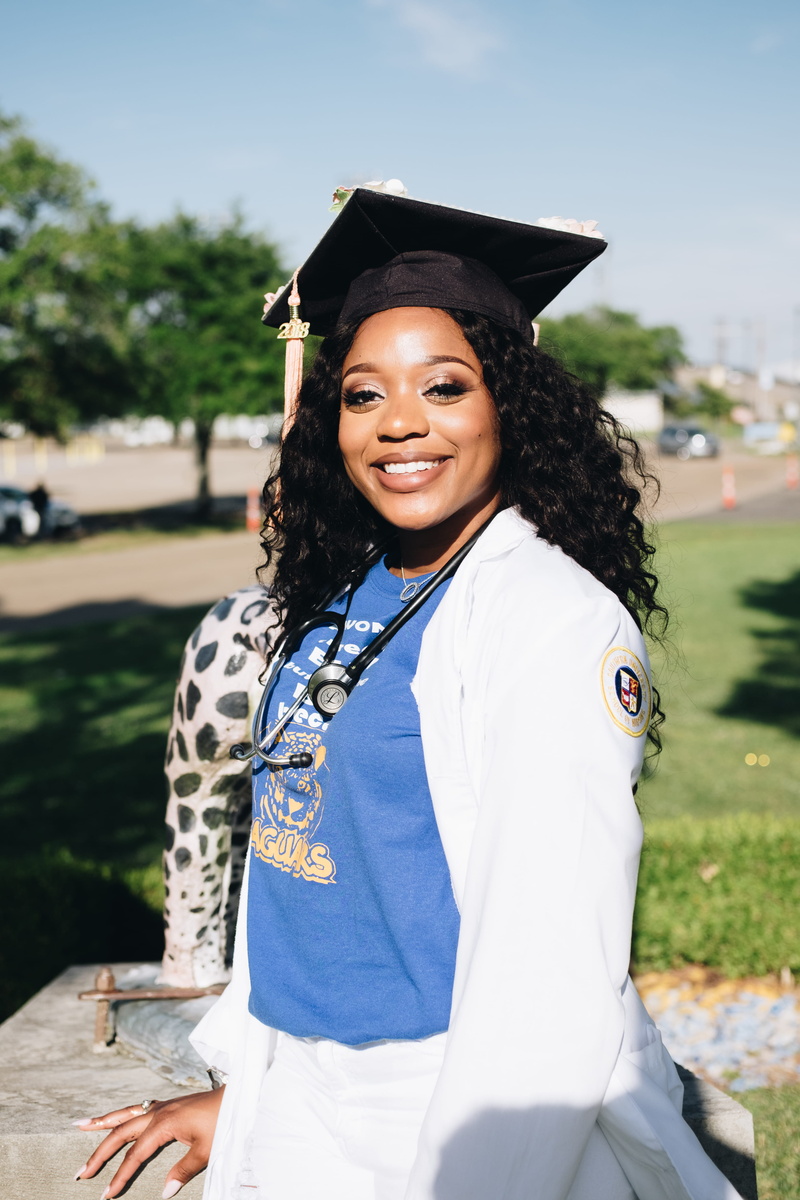 4K, student, young women, focus on foreground, accomplishment, education, graduation gown, outdoors, looking at camera, graduation, person, mortarboard